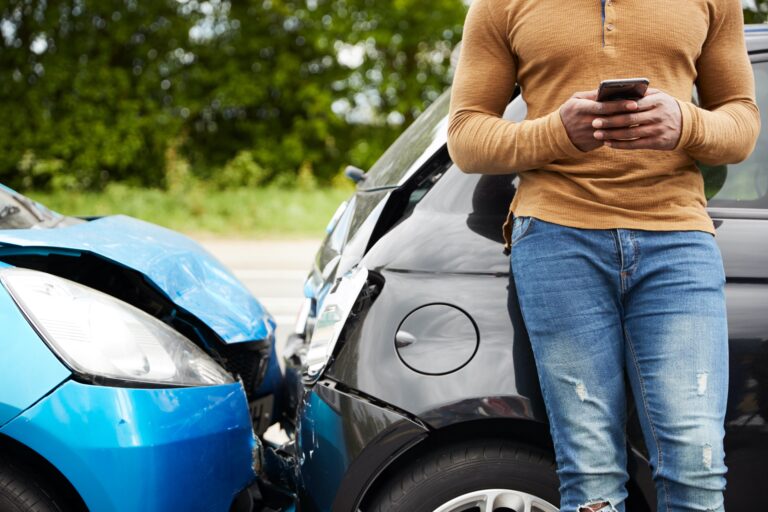 Male,Motorist,Involved,In,Car,Accident,Calling,Insurance,Company,Or